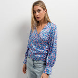 BLUSA CRUZADA ESTAMPADA