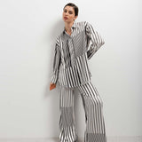 CALÇA FLUIDA RISCAS VERTICAIS