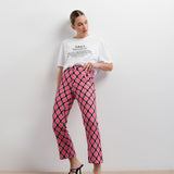 CALÇA ÀS CLOCHE ESTAMPADA ROSA