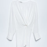 BLUSA TEXTURIZADA COM PORMENOR DE NÓ