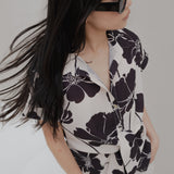 CAMISA NUDO ESTAMPADA