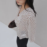 BLUSA VOLANTES LUNARES