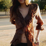 BLUSA GOLD VOLANTES