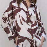 BLUSA SATINADA ESTAMPADA